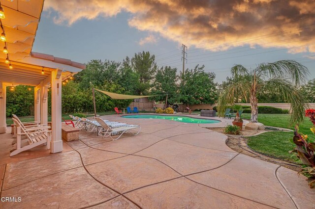 4665 Northridge Dr, Palmdale, CA 93551 - pool at dusk with a patio