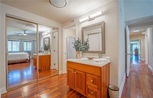 25532 Maximus St, Mission Viejo, CA 92675 - ensuite bathroom with wood finished floors, plenty of natural light, and a ceiling fan