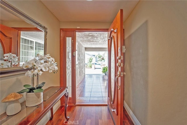 25532 Maximus St, Mission Viejo, CA 92675 - foyer entrance featuring baseboards and wood finished floors
