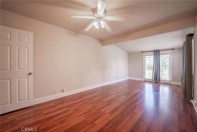25532 Maximus St, Mission Viejo, CA 92675 - spare room with dark wood finished floors, ceiling fan, and beamed ceiling