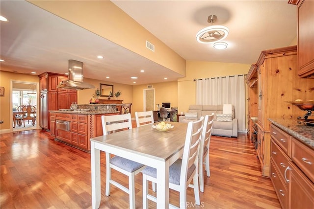 25532 Maximus St, Mission Viejo, CA 92675 - dining space with light wood-type flooring, lofted ceiling, and recessed lighting