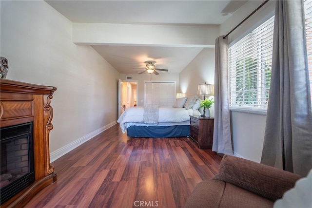 25532 Maximus St, Mission Viejo, CA 92675 - bedroom with dark wood-type flooring, a fireplace, and ceiling fan