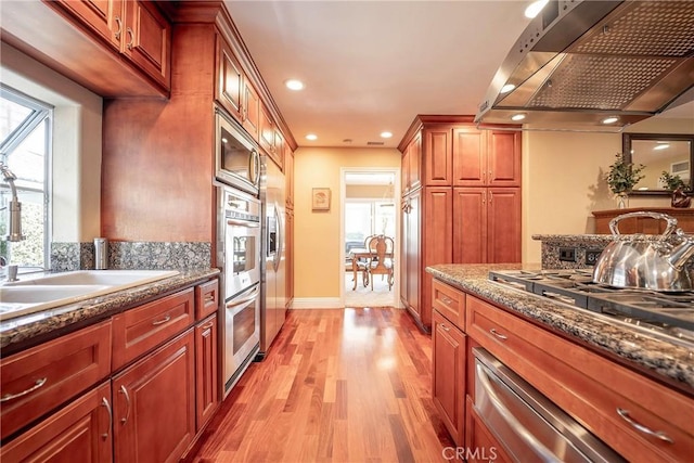 25532 Maximus St, Mission Viejo, CA 92675 - kitchen featuring exhaust hood, healthy amount of natural light, light wood-style flooring, stainless steel appliances, and recessed lighting