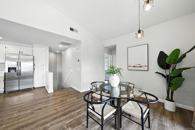 1250 Pinnacle Peak, Chula Vista, CA 91915 - dining room with dark wood-style flooring and lofted ceiling