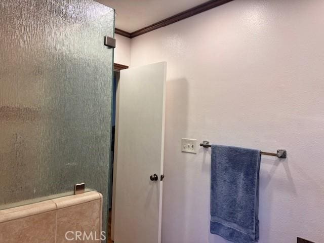 15945 Lashburn St, Whittier, CA 90603 - bathroom with ornamental molding and a shower