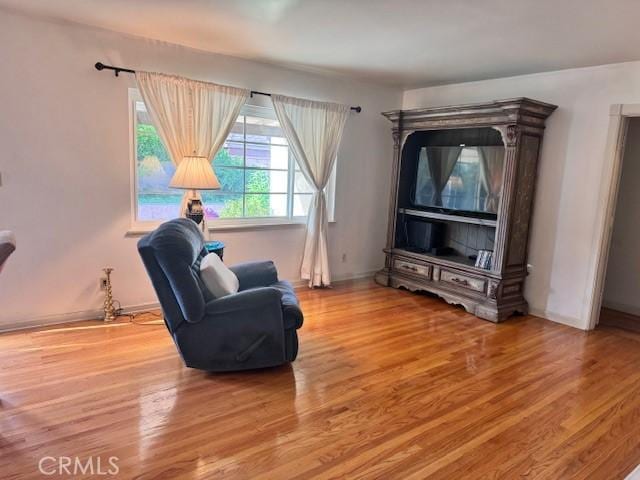 15945 Lashburn St, Whittier, CA 90603 - sitting room with wood finished floors