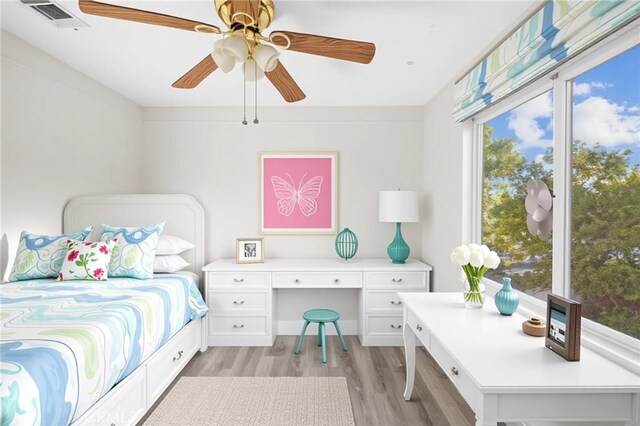 31772 Ridgeview Dr, Lake Elsinore, CA 92532 - bedroom featuring a desk, light wood finished floors, and ceiling fan