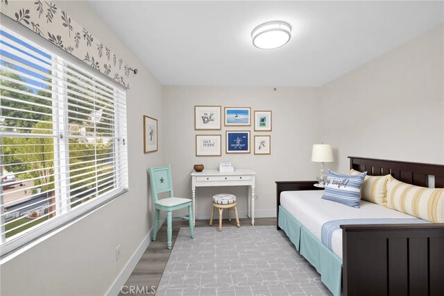 31772 Ridgeview Dr, Lake Elsinore, CA 92532 - bedroom with baseboards and light wood-style flooring