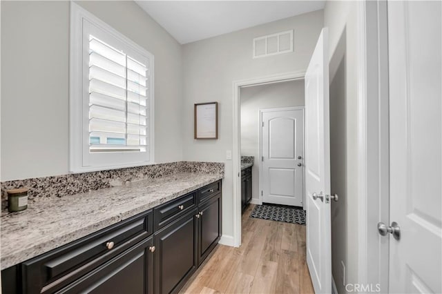 33303 Barmetta Ln, Temecula, CA 92592 - bathroom with wood finished floors and vanity