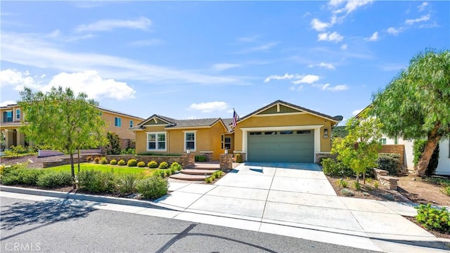 33303 Barmetta Ln, Temecula, CA 92592 - view of front of house featuring stucco siding, concrete driveway, a garage, and stone siding