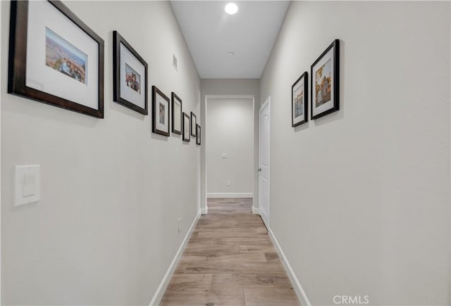 33303 Barmetta Ln, Temecula, CA 92592 - hallway with light wood finished floors and recessed lighting