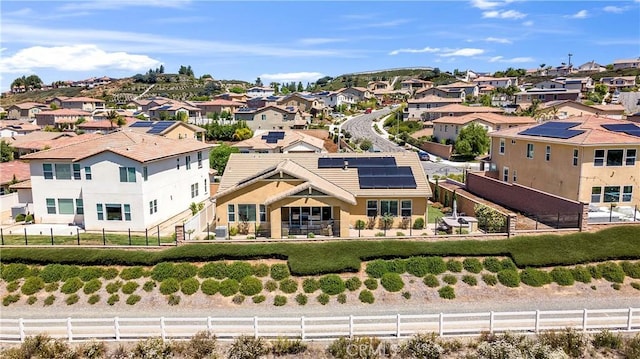 33303 Barmetta Ln, Temecula, CA 92592 - rear view of property with a residential view, a fenced backyard, and roof mounted solar panels