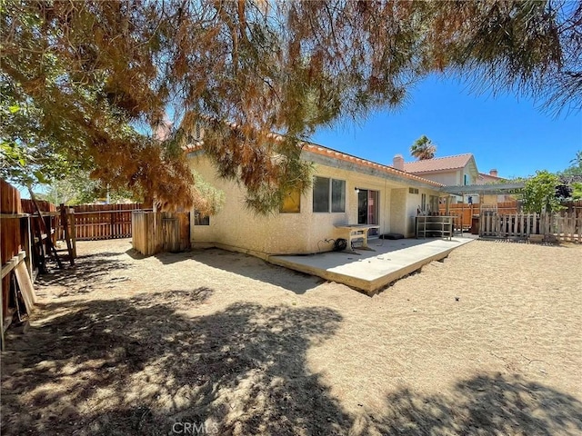 37543 Royal Ct, Palmdale, CA 93552 - rear view of house with stucco siding