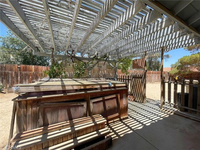 37543 Royal Ct, Palmdale, CA 93552 - fenced backyard featuring a covered hot tub, a pergola, and a patio