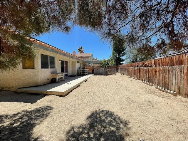 37543 Royal Ct, Palmdale, CA 93552 - fenced backyard with a patio area