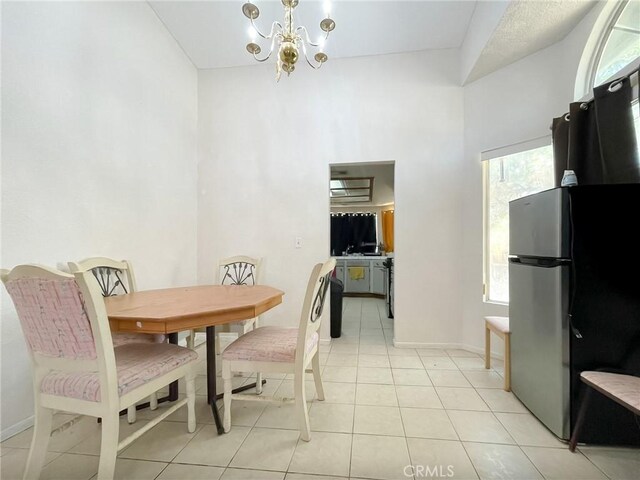 37543 Royal Ct, Palmdale, CA 93552 - dining area with a chandelier and light tile patterned floors
