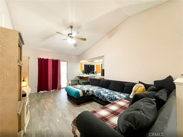 37543 Royal Ct, Palmdale, CA 93552 - living room with light wood finished floors, lofted ceiling, and a ceiling fan