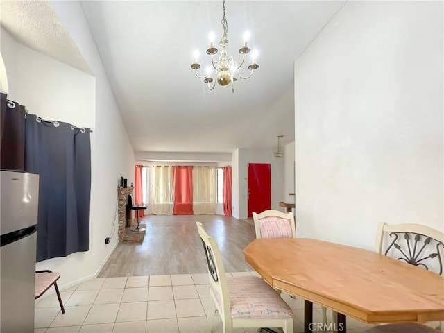 37543 Royal Ct, Palmdale, CA 93552 - dining room with a chandelier and light wood finished floors