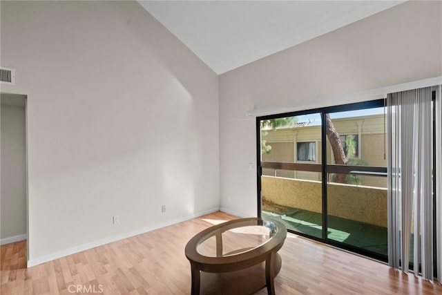 18752 Mandan St Unit 1016, Canyon Country, CA 91351 - empty room featuring wood finished floors and high vaulted ceiling