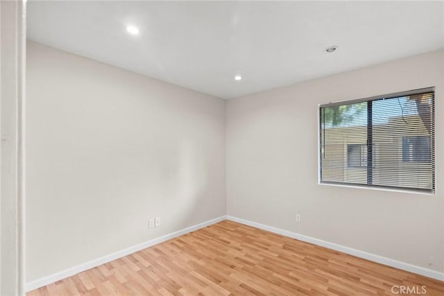 18752 Mandan St Unit 1016, Canyon Country, CA 91351 - unfurnished room with light wood-style flooring and recessed lighting