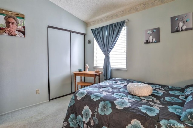7331 Belpine Pl Unit 31, Rancho Cucamonga, CA 91730 - carpeted bedroom featuring lofted ceiling, a closet, and a textured ceiling