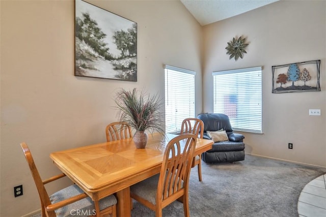 7331 Belpine Pl Unit 31, Rancho Cucamonga, CA 91730 - dining space featuring vaulted ceiling and carpet