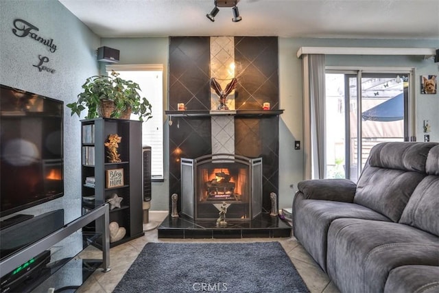7331 Belpine Pl Unit 31, Rancho Cucamonga, CA 91730 - living area featuring a tile fireplace
