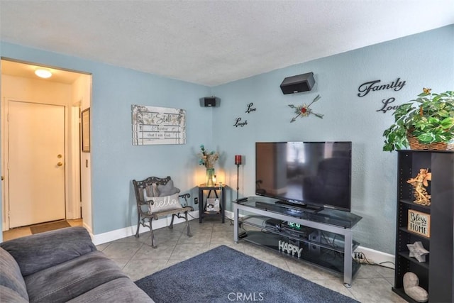 7331 Belpine Pl Unit 31, Rancho Cucamonga, CA 91730 - living area featuring a textured ceiling and tile patterned flooring