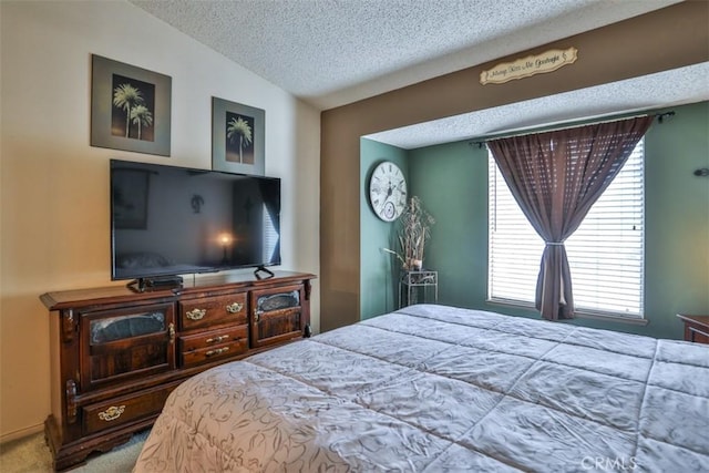 7331 Belpine Pl Unit 31, Rancho Cucamonga, CA 91730 - carpeted bedroom featuring lofted ceiling, a textured ceiling, and multiple windows