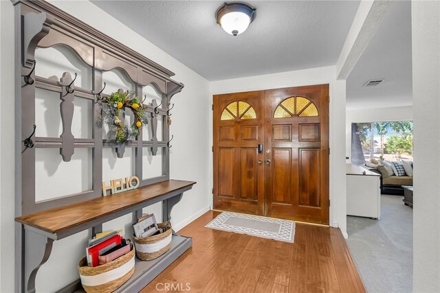1239 Highridge St, Riverside, CA 92506 - entrance foyer with wood finished floors and baseboards