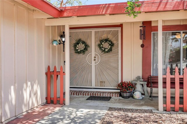 1239 Highridge St, Riverside, CA 92506 - view of exterior entry with board and batten siding