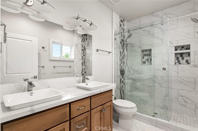 1906 Crandall Way, Paradise, CA 95969 - bathroom featuring marble look tiles, a marble finish shower, and double vanity