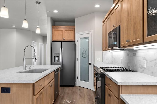 1906 Crandall Way, Paradise, CA 95969 - kitchen featuring black appliances, wood finished floors, light countertops, tasteful backsplash, and recessed lighting