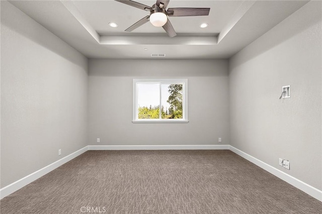 1906 Crandall Way, Paradise, CA 95969 - spare room featuring a raised ceiling, recessed lighting, ceiling fan, and dark carpet