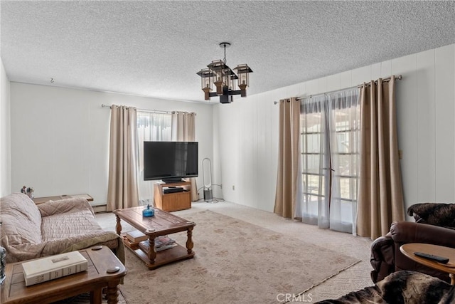 1529 Pomeroy Rd, Arroyo Grande, CA 93420 - carpeted living room with a chandelier and a textured ceiling
