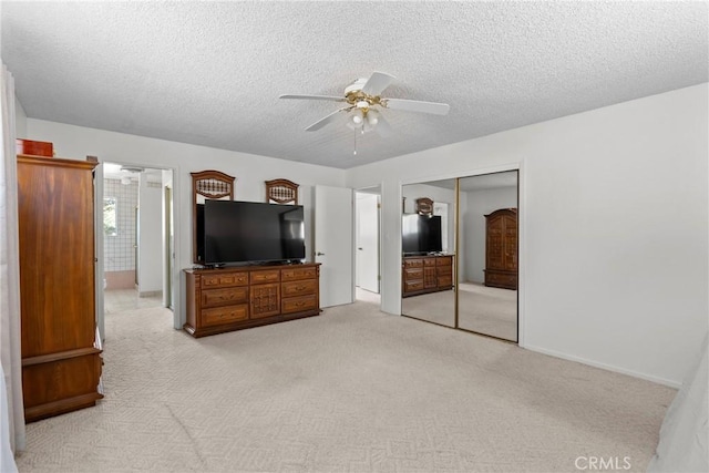 1529 Pomeroy Rd, Arroyo Grande, CA 93420 - unfurnished bedroom featuring a textured ceiling, a closet, light carpet, and a ceiling fan