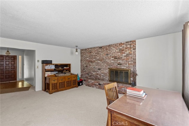 1529 Pomeroy Rd, Arroyo Grande, CA 93420 - carpeted living room with a textured ceiling and a brick fireplace