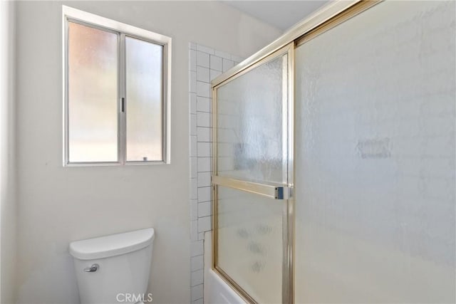 1529 Pomeroy Rd, Arroyo Grande, CA 93420 - bathroom featuring toilet and shower / bath combination with glass door