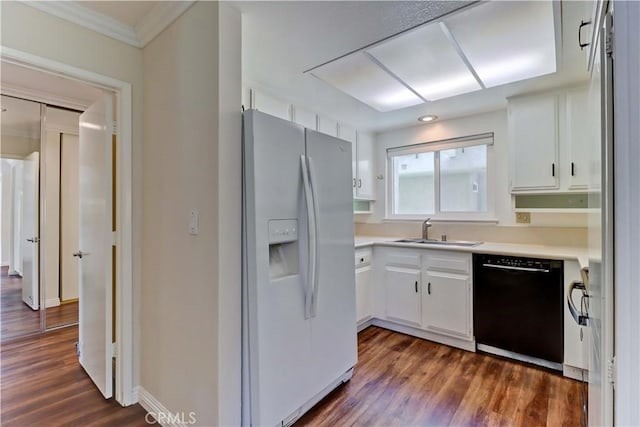 2391 Via Mariposa W Unit 2E, Laguna Woods, CA 92637 - kitchen with white refrigerator with ice dispenser, dishwasher, light countertops, dark wood-style flooring, and white cabinetry