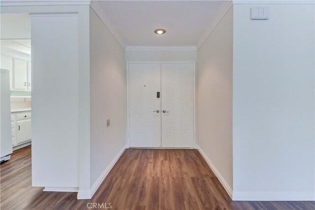 2391 Via Mariposa W Unit 2E, Laguna Woods, CA 92637 - corridor with wood finished floors and crown molding