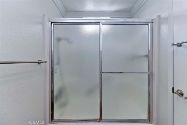 2391 Via Mariposa W Unit 2E, Laguna Woods, CA 92637 - full bath featuring crown molding and a shower with shower door