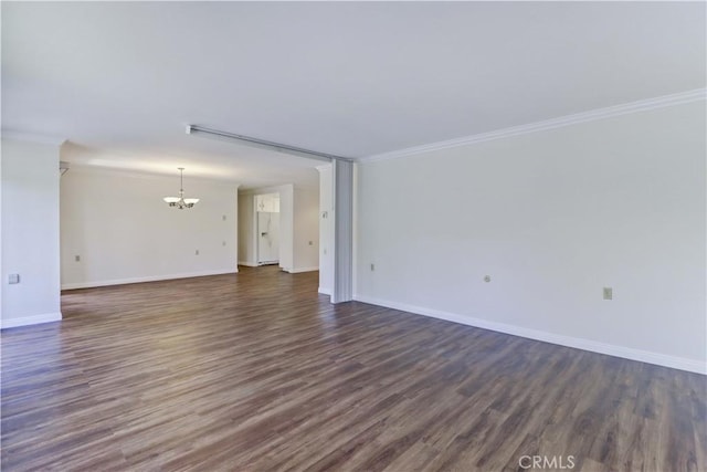2391 Via Mariposa W Unit 2E, Laguna Woods, CA 92637 - unfurnished living room with a chandelier, dark wood-type flooring, and crown molding