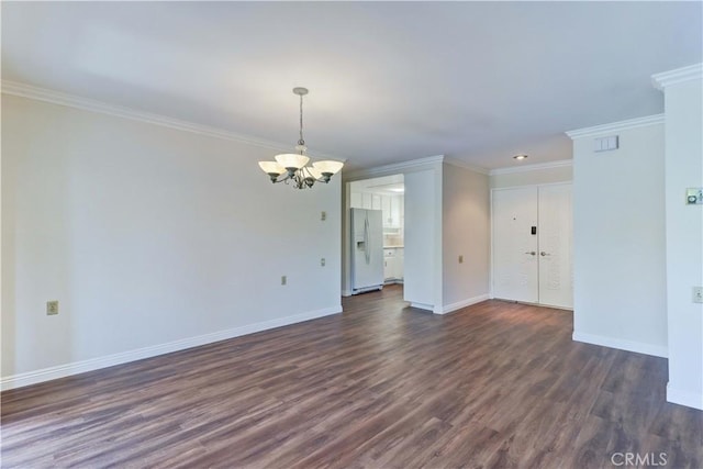 2391 Via Mariposa W Unit 2E, Laguna Woods, CA 92637 - unfurnished living room featuring a chandelier, dark wood-style floors, and ornamental molding