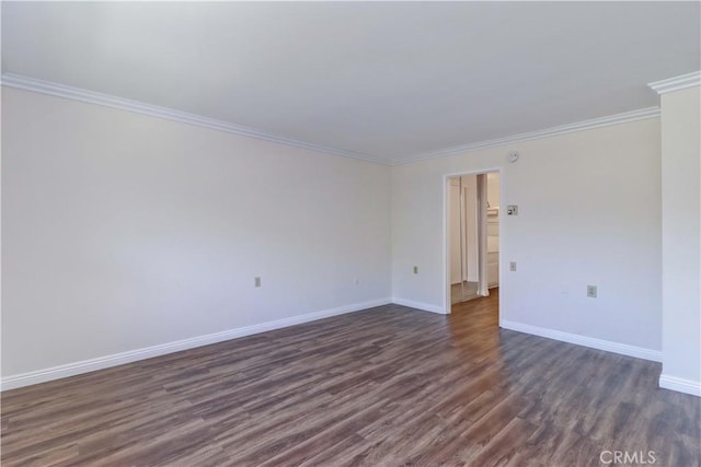 2391 Via Mariposa W Unit 2E, Laguna Woods, CA 92637 - unfurnished room with dark wood finished floors and ornamental molding