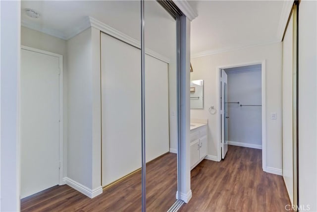 2391 Via Mariposa W Unit 2E, Laguna Woods, CA 92637 - hallway with dark wood-type flooring and crown molding