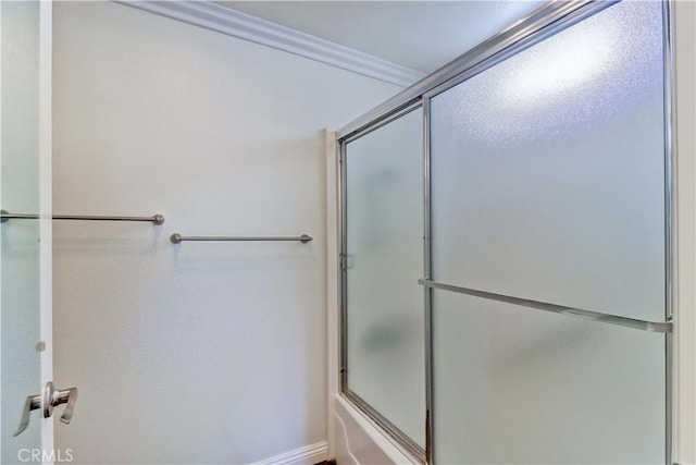 2391 Via Mariposa W Unit 2E, Laguna Woods, CA 92637 - bathroom featuring bath / shower combo with glass door