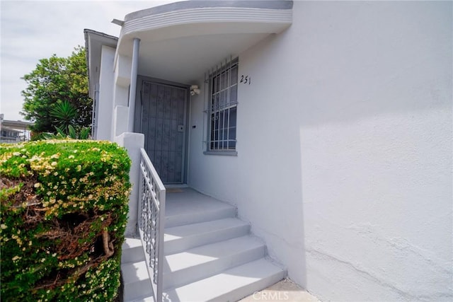 251 W 112th St, Los Angeles, CA 90061 - property entrance featuring stucco siding
