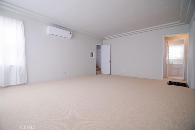 251 W 112th St, Los Angeles, CA 90061 - carpeted spare room with a wall mounted AC and crown molding