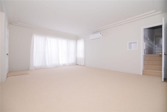 251 W 112th St, Los Angeles, CA 90061 - unfurnished room featuring an AC wall unit, carpet, stairs, and crown molding