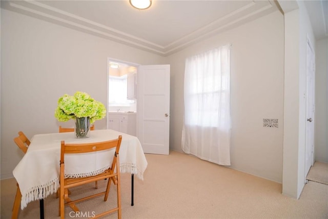 251 W 112th St, Los Angeles, CA 90061 - dining area featuring light colored carpet and healthy amount of natural light